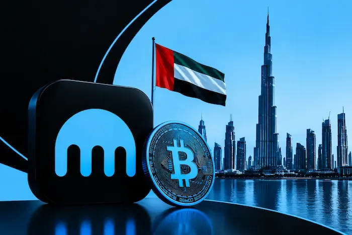 Kraken logo and Bitcoin coin against Dubai’s skyline and UAE flag in blue and black, representing Payward’s crypto license approval.